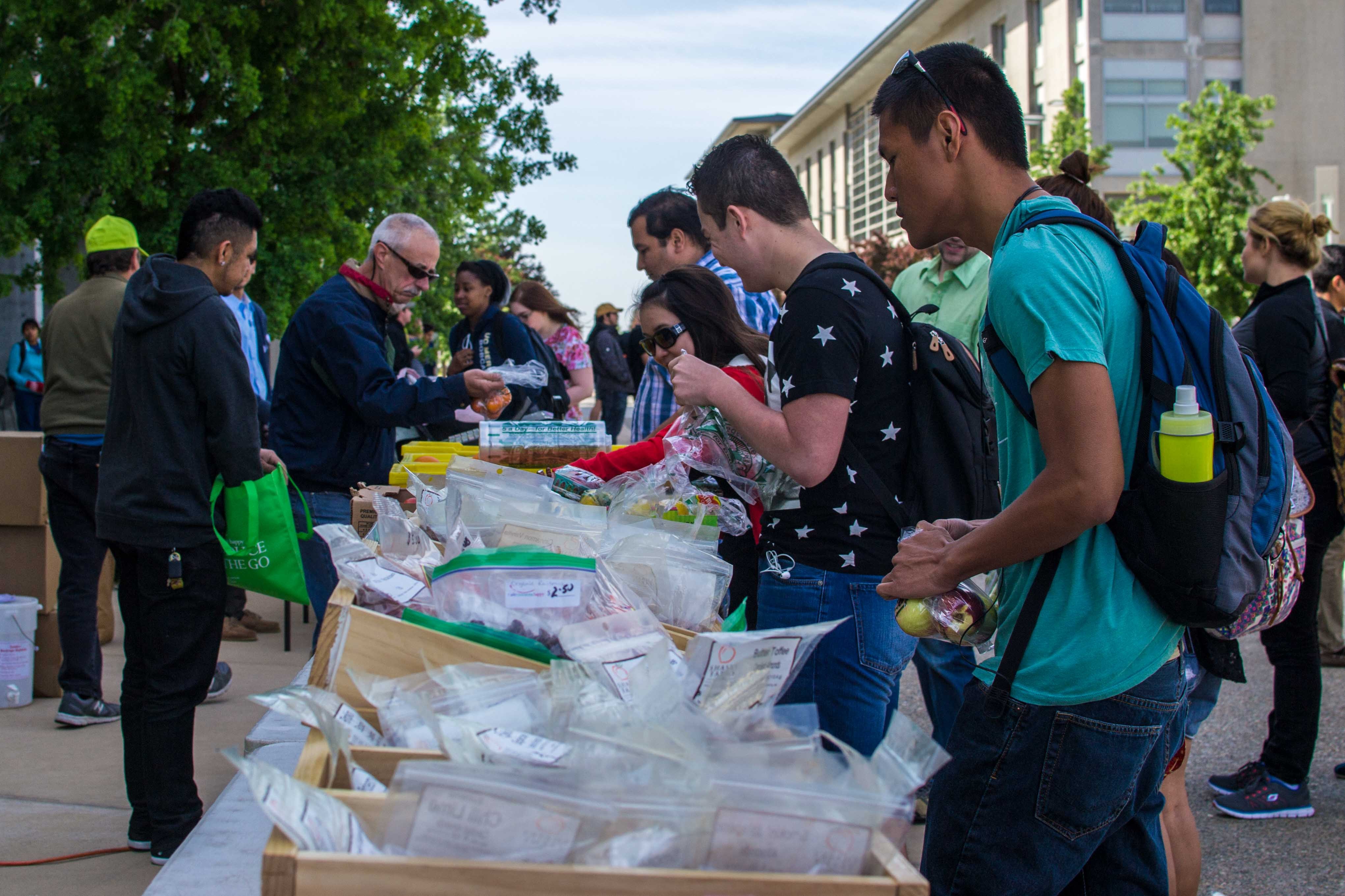 Students browse the wide selection of fresh food.